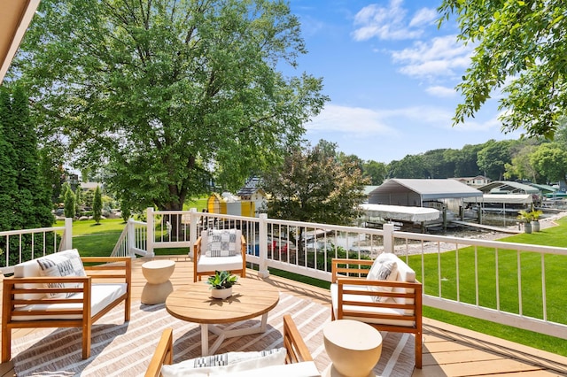 1701 Baywood Ln, Mound, MN 55364 - wooden deck featuring an outdoor living space, a lawn, and boat lift