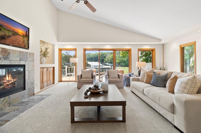 1701 Baywood Ln, Mound, MN 55364 - living area with lofted ceiling, a fireplace, carpet floors, and a ceiling fan