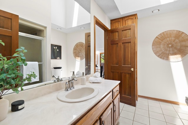 1701 Baywood Ln, Mound, MN 55364 - full bath featuring tile patterned flooring, vanity, and a stall shower