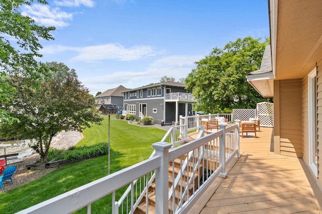 1701 Baywood Ln, Mound, MN 55364 - wooden terrace with a lawn and outdoor dining space