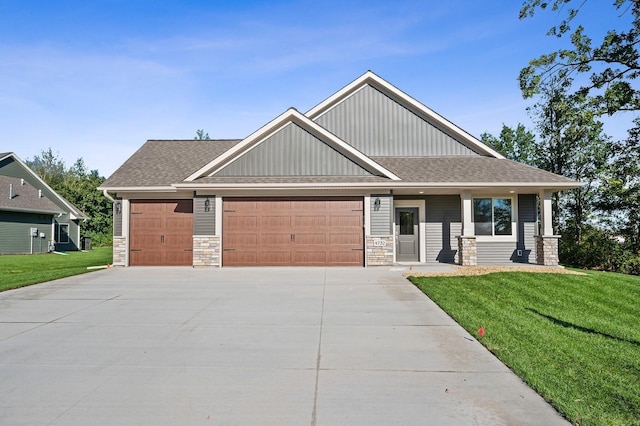 4786 384th St, North Branch, MN 55056 - craftsman house with a garage, a front lawn, and stone siding