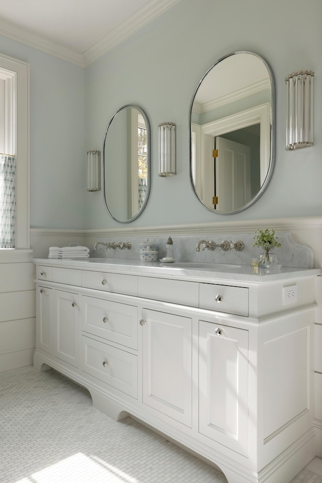 14XX Fox St, Wayzata, MN 55391 - bathroom with double vanity, ornamental molding, and a wainscoted wall
