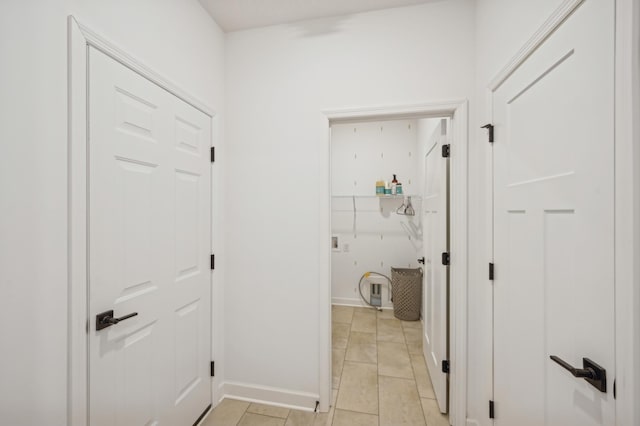 6501 Tamarack Ln, Corcoran, MN 55340 - hallway featuring baseboards and light tile patterned floors