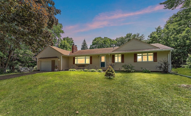 1682 Oakdale Ave W, Saint Paul, MN 55118 - ranch-style house featuring a garage, a chimney, a front lawn, and driveway