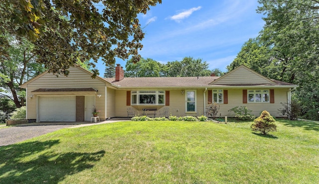 1682 Oakdale Ave W, Saint Paul, MN 55118 - ranch-style home with a chimney, asphalt driveway, an attached garage, and a front lawn