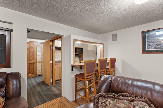 1682 Oakdale Ave W, Saint Paul, MN 55118 - living room featuring a textured ceiling