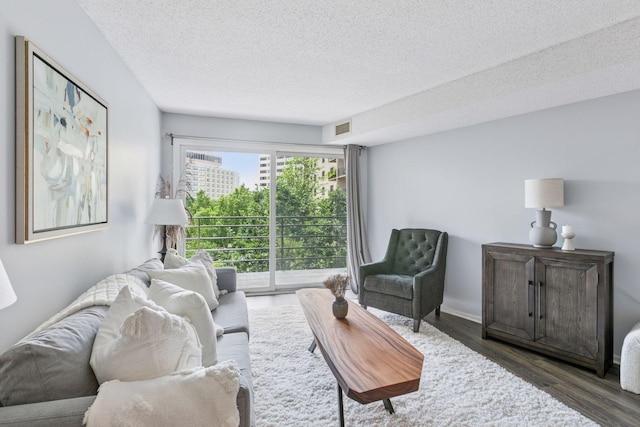 1200 Nicollet Mall Unit 523, Minneapolis, MN 55403 - living area with a textured ceiling and wood finished floors