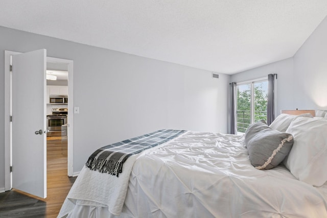 1200 Nicollet Mall Unit 523, Minneapolis, MN 55403 - bedroom featuring wood finished floors and baseboards