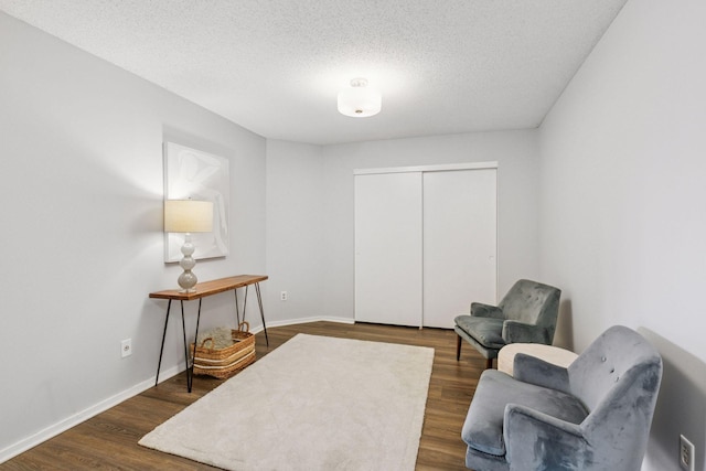 1200 Nicollet Mall Unit 523, Minneapolis, MN 55403 - living area featuring dark wood-type flooring and a textured ceiling