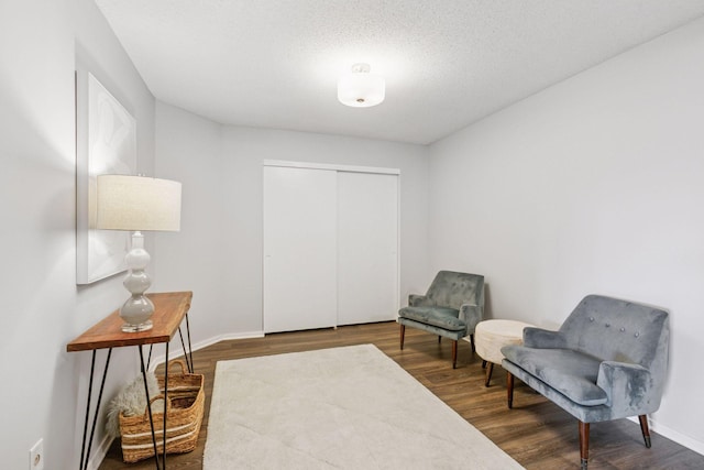 1200 Nicollet Mall Unit 523, Minneapolis, MN 55403 - living area featuring dark wood-type flooring and a textured ceiling