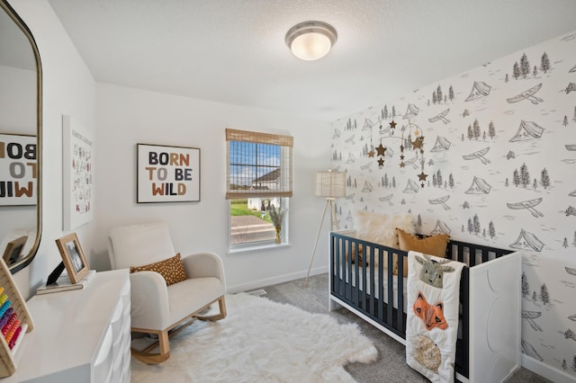 10663 Hemingway Ave S, Cottage Grove, MN 55016 - bedroom featuring a nursery area and baseboards