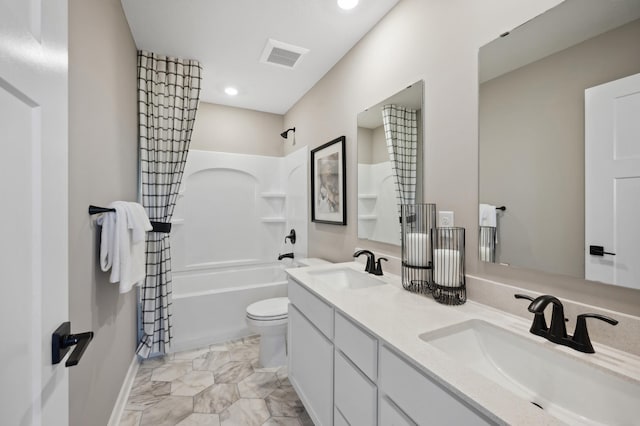 10663 Hemingway Ave S, Cottage Grove, MN 55016 - bathroom featuring double vanity, shower / bath combo with shower curtain, and recessed lighting