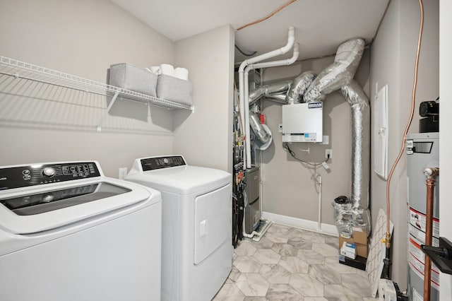 10663 Hemingway Ave S, Cottage Grove, MN 55016 - laundry area with water heater and washing machine and dryer