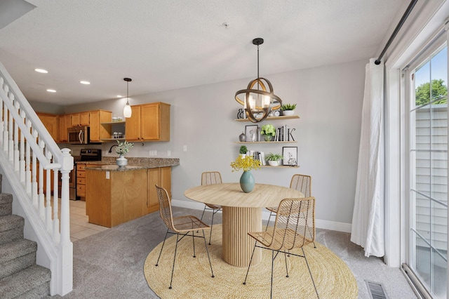 18347 Coneflower Ln, Eden Prairie, MN 55346 - dining space featuring light carpet, stairway, a chandelier, and recessed lighting