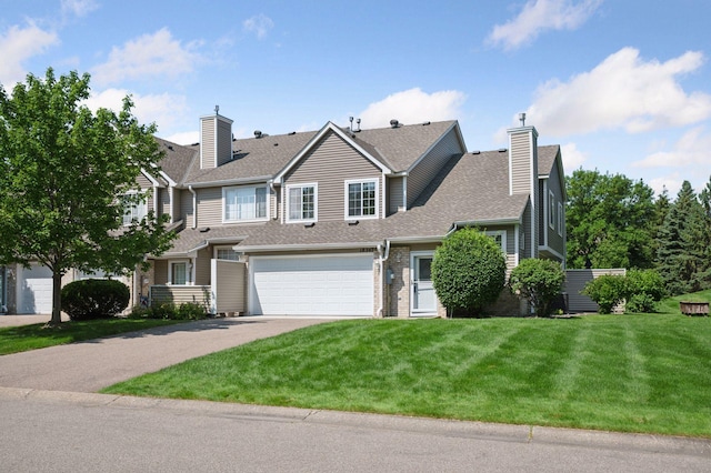 18347 Coneflower Ln, Eden Prairie, MN 55346 - traditional home featuring a chimney, driveway, an attached garage, a front yard, and a shingled roof