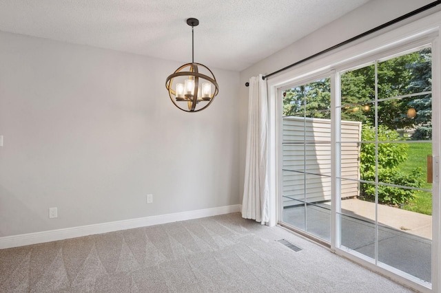 18347 Coneflower Ln, Eden Prairie, MN 55346 - spare room featuring carpet floors, a chandelier, and a textured ceiling