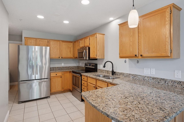18347 Coneflower Ln, Eden Prairie, MN 55346 - kitchen featuring stainless steel appliances, a peninsula, light tile patterned flooring, light stone countertops, and hanging light fixtures