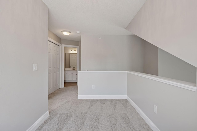 18347 Coneflower Ln, Eden Prairie, MN 55346 - hallway with carpet and baseboards