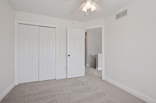 18347 Coneflower Ln, Eden Prairie, MN 55346 - unfurnished bedroom with carpet floors, a closet, and a ceiling fan