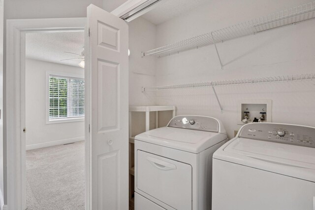 18347 Coneflower Ln, Eden Prairie, MN 55346 - laundry room with washing machine and clothes dryer, carpet floors, a ceiling fan, and a textured ceiling