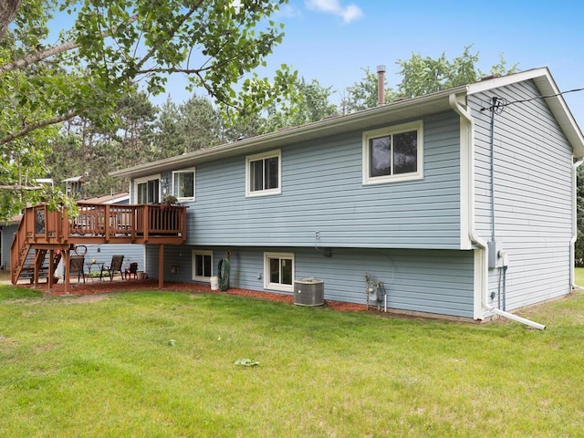1507 234th Ln NE, Bethel, MN 55005 - rear view of house with a deck and a lawn