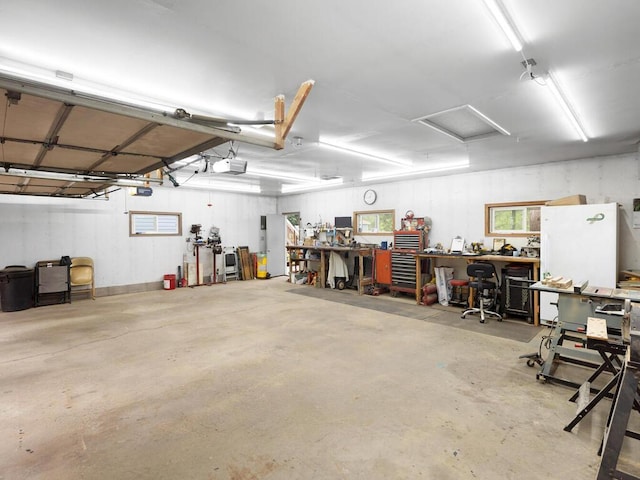 1507 234th Ln NE, Bethel, MN 55005 - garage featuring a workshop area and a garage door opener