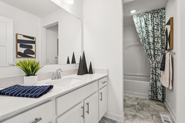 2436 Hadley Hills Dr NE, Rochester, MN 55906 - full bathroom with marble finish floors, vanity, and shower / bath combination with curtain