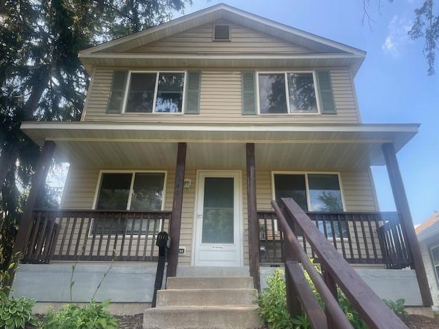 1141 5th St E, Saint Paul, MN 55106 - view of front of property featuring a porch