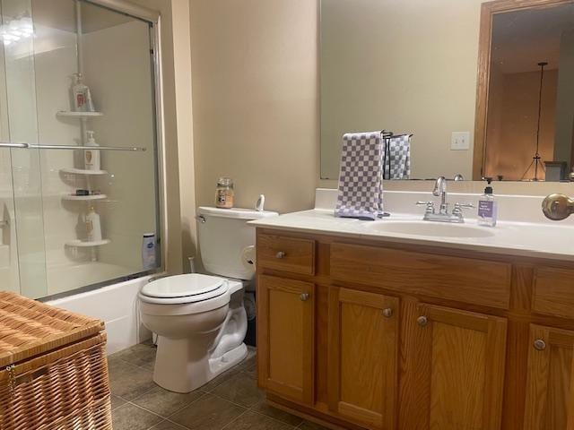 1141 5th St E, Saint Paul, MN 55106 - bathroom with vanity, tile patterned flooring, and enclosed tub / shower combo