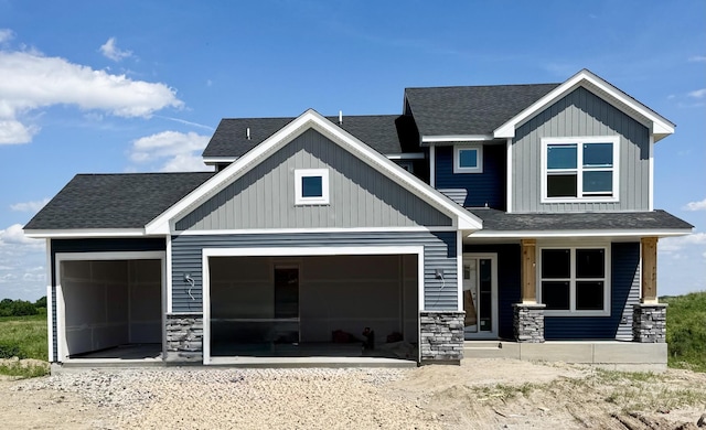 8398 Lander Ave NE, Otsego, MN 55330 - craftsman inspired home with stone siding, a garage, and roof with shingles