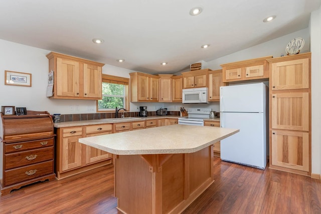 39205 436th St, Saint Peter, MN 56082 - kitchen featuring white appliances, vaulted ceiling, light countertops, dark wood-style floors, and light brown cabinetry