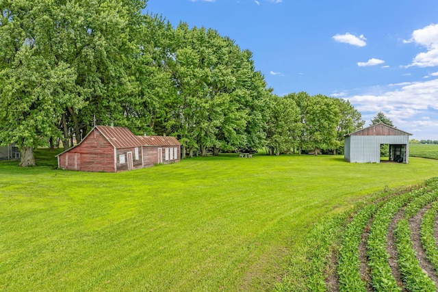 39205 436th St, Saint Peter, MN 56082 - view of grassy yard with an outbuilding and an outdoor structure
