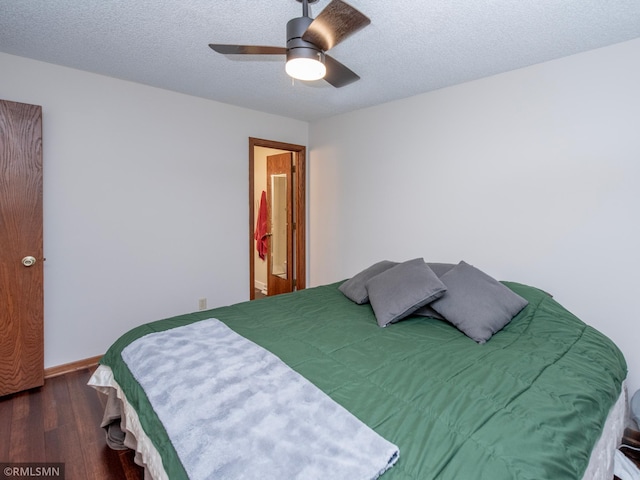 5424 Vernon Ct, Savage, MN 55378 - bedroom featuring wood finished floors, a textured ceiling, and a ceiling fan