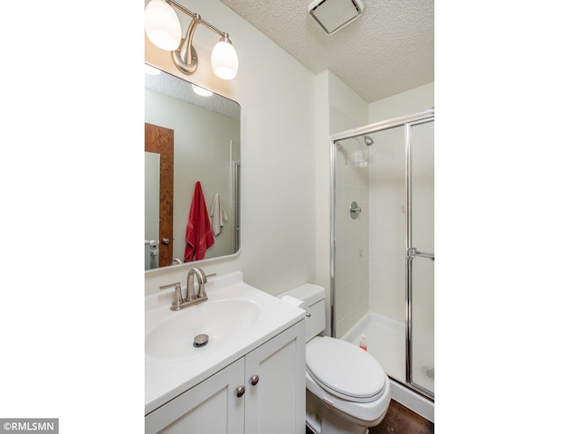 5424 Vernon Ct, Savage, MN 55378 - full bathroom featuring a textured ceiling, vanity, and a shower stall