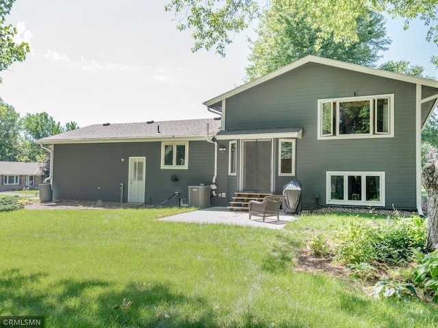 5424 Vernon Ct, Savage, MN 55378 - rear view of house featuring a patio, a lawn, and entry steps