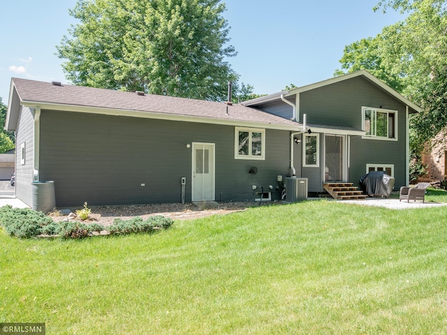 5424 Vernon Ct, Savage, MN 55378 - back of house featuring a yard and entry steps