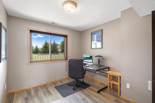 20736 196th Ave NW, Big Lake Twp, MN 55309 - office space with a textured ceiling and wood finished floors