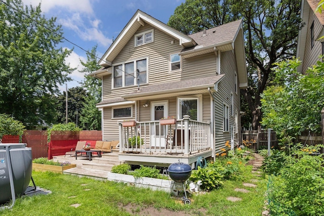 1756 Minnehaha Ave W, Saint Paul, MN 55104 - rear view of house with a wooden deck, an outdoor living space, and a shingled roof