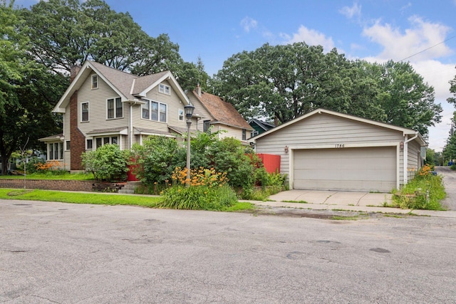 1756 Minnehaha Ave W, Saint Paul, MN 55104 - view of front of property featuring a garage and a chimney
