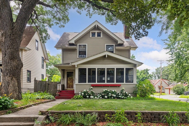 1756 Minnehaha Ave W, Saint Paul, MN 55104 - view of front of home featuring a shingled roof and a chimney