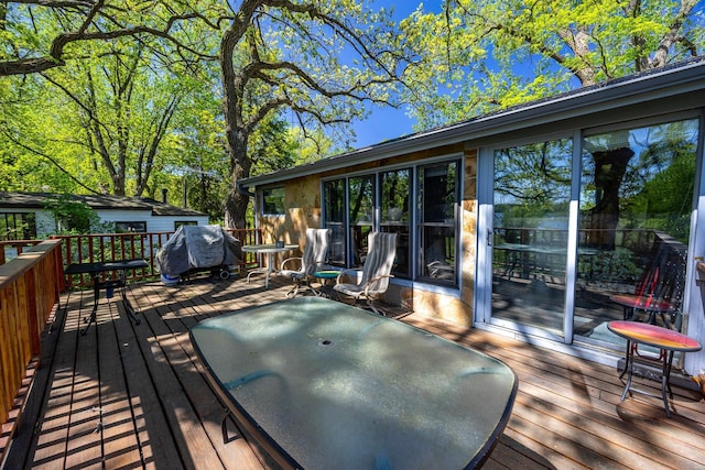14676 Devitt Ave NW, Silver Creek Twp, MN 55362 - wooden deck featuring grilling area and outdoor dining space