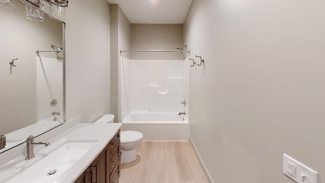 2334 9th St W, Albert Lea, MN 56007 - full bathroom featuring vanity, bathing tub / shower combination, and wood finished floors