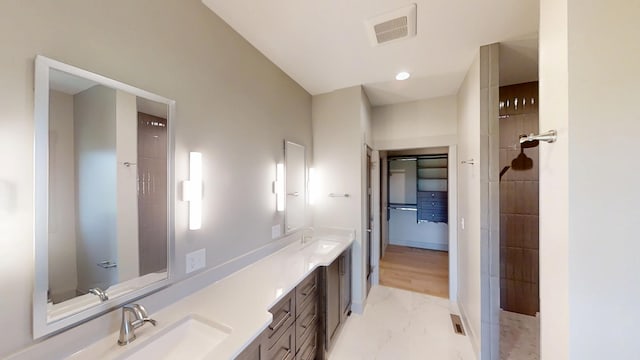 2334 9th St W, Albert Lea, MN 56007 - bathroom featuring marble finish floors and double vanity