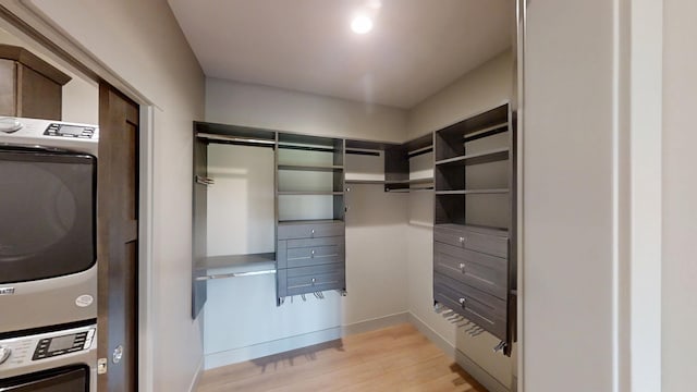 2334 9th St W, Albert Lea, MN 56007 - spacious closet with stacked washer / dryer and light wood-style flooring