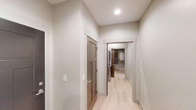 2334 9th St W, Albert Lea, MN 56007 - hallway featuring light wood-style flooring and baseboards