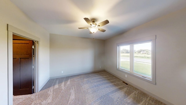 2334 9th St W, Albert Lea, MN 56007 - spare room with ceiling fan and carpet floors