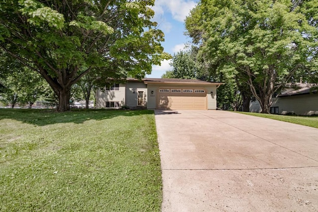 5445 Large Ave NE, Albertville, MN 55301 - view of front of home featuring driveway, an attached garage, and a front yard