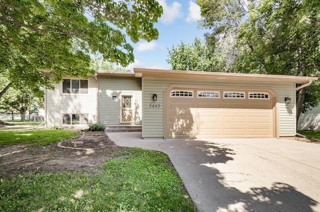 5445 Large Ave NE, Albertville, MN 55301 - view of front of property featuring driveway and an attached garage