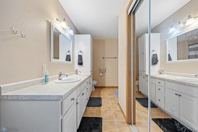 362 5th Ave N, Casselton, ND 58012 - full bath with double vanity and tile patterned floors