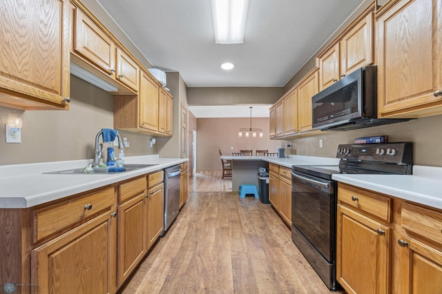 362 5th Ave N, Casselton, ND 58012 - kitchen featuring electric range, dishwasher, light wood-type flooring, and light countertops